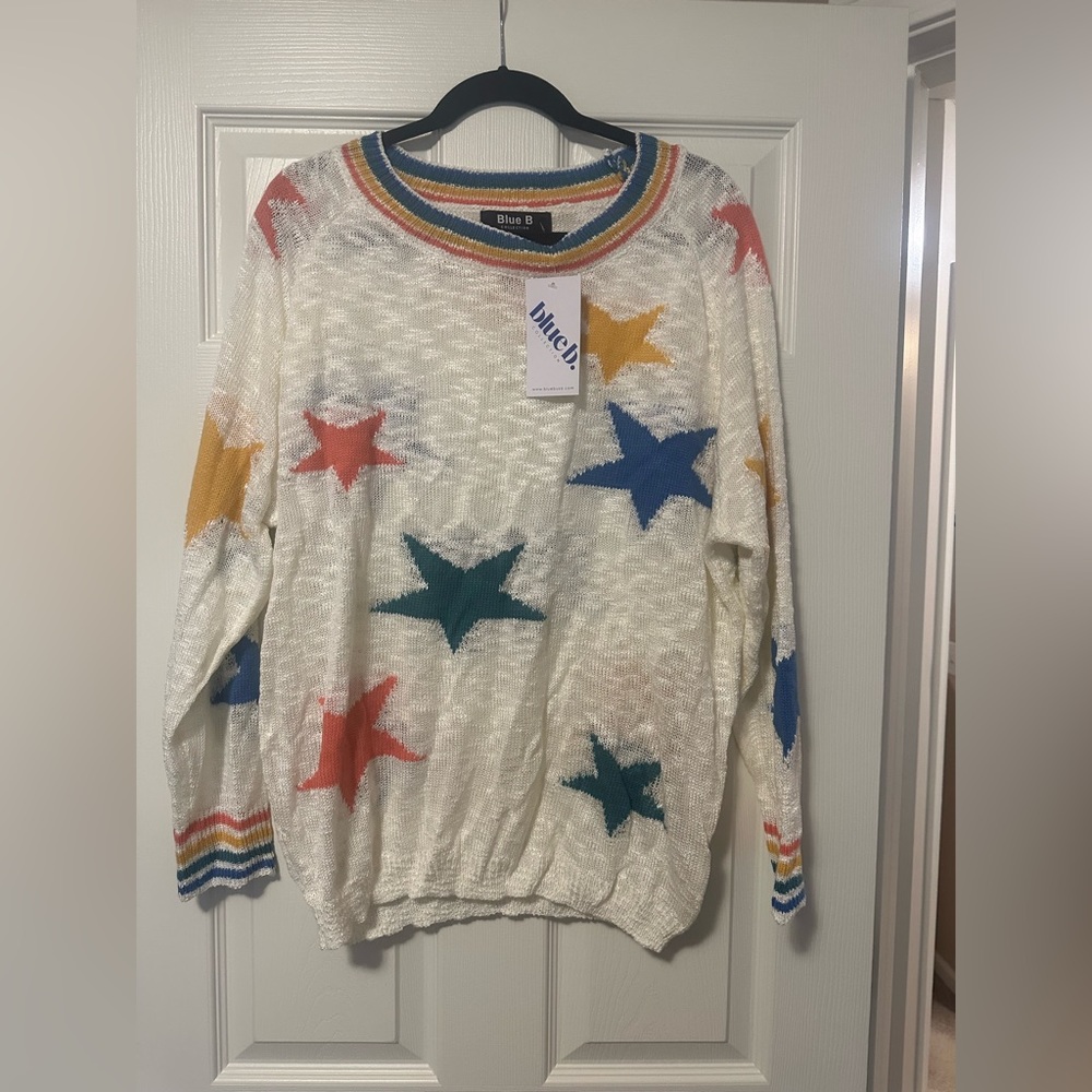 NWT blue b. Light weight sweater.  Cream with colored starts. Size large.
